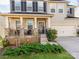 Inviting front porch with stylish railings and space for seating, leading to the home's entrance at 3449 Southern Red Oak Ln, Gastonia, NC 28056