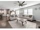 Open concept living area features hardwood floors and seamless access to the dining and kitchen areas at 3449 Southern Red Oak Ln, Gastonia, NC 28056