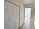Hallway with closets, carpeted floors, and access to the bedroom, offering plenty of storage space at 3812 York Aly, Lake Park, NC 28079