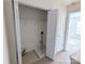Laundry room with washer/dryer hookups and shelving, providing a practical and organized space at 3812 York Aly, Lake Park, NC 28079