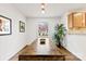Open dining room featuring modern lighting, a dining table, and a view of the outdoors at 3918 Woodgreen Ter, Charlotte, NC 28205
