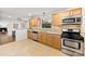 Well-equipped kitchen with stainless steel appliances, tile backsplash, and spacious countertops at 3918 Woodgreen Ter, Charlotte, NC 28205