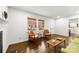 Cozy living room with hardwood floors, natural light, and view of the outdoors at 3918 Woodgreen Ter, Charlotte, NC 28205