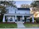 Charming home with a wide porch, swing, and landscaped front yard at 401 W Hoke St, Landis, NC 28088