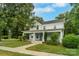 Traditional home with a welcoming front porch and lush landscaping at 401 W Hoke St, Landis, NC 28088