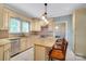 Traditional eat-in kitchen featuring stainless steel appliances, granite countertops, and tile backsplash at 401 W Hoke St, Landis, NC 28088