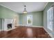 Inviting living room with hardwood floors, fireplace and plenty of natural light at 401 W Hoke St, Landis, NC 28088