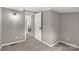Bedroom with wall to wall carpet, gray walls, and white trim at 428 Chester St, Lancaster, SC 29720
