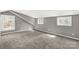 Neutral bedroom with ample natural light, gray walls, and plush carpeting at 428 Chester St, Lancaster, SC 29720