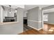 View of the kitchen, showcasing the breakfast bar and a glimpse into the dining area at 428 Chester St, Lancaster, SC 29720