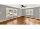 Bright, airy living room featuring hardwood floors and large windows for natural light at 428 Chester St, Lancaster, SC 29720
