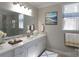 Bathroom featuring updated hardware, marble counters, and a patterned rug at 4531 Deer Run None, Rock Hill, SC 29732