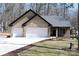 Charming brick home featuring an attached two-car garage and a well-manicured front lawn at 4531 Deer Run None, Rock Hill, SC 29732