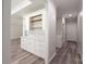 Bright hallway featuring built-in cabinetry with quartz countertop and stylish backsplash at 4531 Deer Run None, Rock Hill, SC 29732