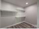 Walk-in closet with multiple shelves providing ample storage space at 4531 Deer Run None, Rock Hill, SC 29732