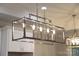 Modern lighting fixture hanging above an island at 4531 Deer Run None, Rock Hill, SC 29732