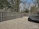 Backyard with a hardscaped patio and a privacy fence at 5091 Windward Dr, Tega Cay, SC 29708