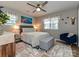 Bedroom featuring a ceiling fan, large windows, and an area rug at 5091 Windward Dr, Tega Cay, SC 29708
