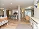 Open-concept living space with modern furnishings and a view into the updated kitchen area at 5091 Windward Dr, Tega Cay, SC 29708