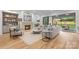 Bright and airy living room with fireplace opens to an outdoor living space at 5124 Lansing Dr, Charlotte, NC 28270
