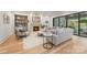 Inviting living room featuring a fireplace, built-in shelving, and comfortable seating arrangement for relaxation at 5124 Lansing Dr, Charlotte, NC 28270