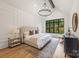 Spacious main bedroom with high ceiling, chandelier, and a wall of windows at 5124 Lansing Dr, Charlotte, NC 28270