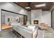 Outdoor patio has wood ceiling, fireplace and seating area with view of the main house at 5124 Lansing Dr, Charlotte, NC 28270
