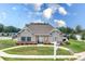 Community pool house with gray siding, brick base, and gated pool at 5367 Heartwood Ln, Denver, NC 28037