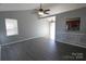 Living room with open view into kitchen and updated paint at 5809 Carolina Manor Ct, Indian Trail, NC 28079