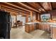 Spacious wood kitchen with oak cabinets, white appliances, stainless sink, and plenty of countertop space at 5912 Potter S Rd, Waxhaw, NC 28173