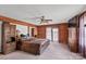 A luxurious primary bedroom, complete with wood paneling and spacious closets at 5912 Potter S Rd, Waxhaw, NC 28173