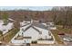 Aerial exterior showcasing the rear of the property with a fenced yard and patio at 7138 Stonington Ln, Charlotte, NC 28227