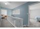 Well-lit hallway with an open view of the bedrooms at 7138 Stonington Ln, Charlotte, NC 28227