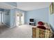 Living room with french doors, carpeted flooring, and furniture at 7138 Stonington Ln, Charlotte, NC 28227
