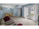 Living room with french doors, carpeted flooring, and furniture at 7138 Stonington Ln, Charlotte, NC 28227