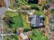 Aerial view of a home showcasing its roof, driveway, and well-manicured yard at 8017 Talcott Dr, Mint Hill, NC 28227
