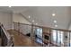 This foyer overlooks a living room and stone fireplace at 8017 Talcott Dr, Mint Hill, NC 28227