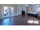 This bedroom features an attached sitting room, and sliding door to the porch at 8017 Talcott Dr, Mint Hill, NC 28227