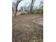 Image of backyard with sparse vegetation at 821 S Oakland St, Gastonia, NC 28054