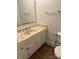 Bathroom vanity showcasing ample storage and a neutral countertop at 821 S Oakland St, Gastonia, NC 28054