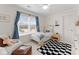 Cozy bedroom with a car-shaped bed, natural light, and stylish decor at 846 Wriston Pl, Charlotte, NC 28209