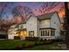 Charming two-story home with a manicured lawn, beautiful landscaping, and inviting front porch at 846 Wriston Pl, Charlotte, NC 28209