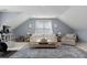 Inviting living room with neutral walls and decor, cozy seating, and a large blue accent rug at 846 Wriston Pl, Charlotte, NC 28209