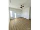 Bedroom with ceiling fan, double closet doors and luxury vinyl flooring at 8827 Wingard Rd, Waxhaw, NC 28173