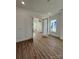 Open living room area filled with natural light and an open doorway at 8827 Wingard Rd, Waxhaw, NC 28173