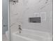 Modern bathroom featuring sleek soaking tub and high-end shower fixtures at 913 Wilson W Lee Blvd, Statesville, NC 28677