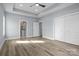Spacious bedroom featuring vinyl plank floors and access to ensuite bath and closets at 913 Wilson W Lee Blvd, Statesville, NC 28677