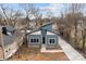 Aerial view of a blue house, modern design, clean lines, and driveway at 913 Wilson W Lee Blvd, Statesville, NC 28677