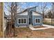 Blue home with contemporary design, contrasting white trim, and new concrete driveway at 913 Wilson W Lee Blvd, Statesville, NC 28677