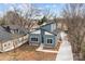 Overhead perspective of blue home, highlighting its modern roof and neighborhood setting at 913 Wilson W Lee Blvd, Statesville, NC 28677